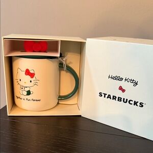 Starbucks Hello Kitty Mug with Green Handle and Red Bow